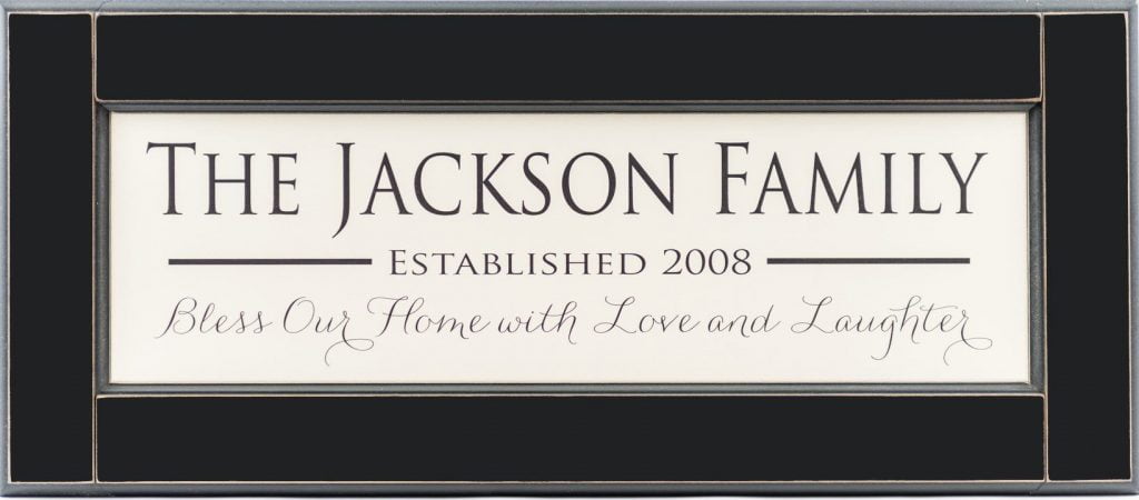 Personalized wood framed Sign White wood sign with black family name framed in black wood frame with saying "Bless our home with love and laughter", and established year in black