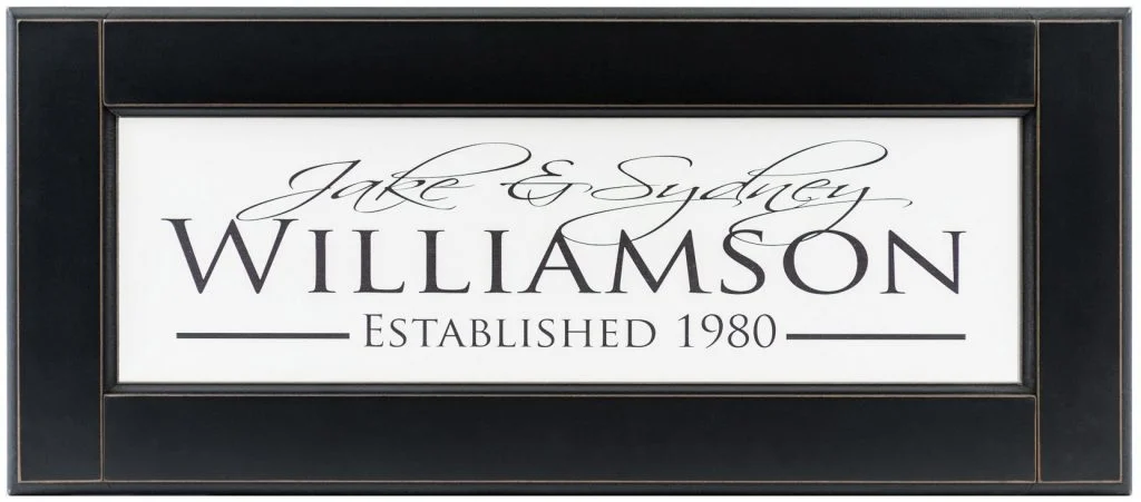 Personalized wood framed Sign White wood sign with black family name, couples names and established date framed in black wood frame complete view