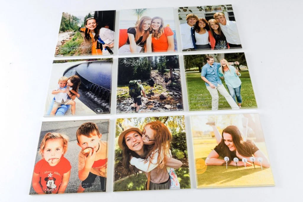a set of nine square photos in a 3 row by 3 column format all printed on wood