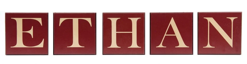 Boys personalized name letters. Red wood blocks with tan text.
