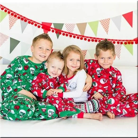 wood Christmas photo of children in their Christmas pajamas