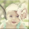 wood photo of baby girl with flower head band